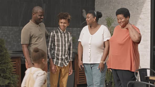 African Family Posing on Camera alt