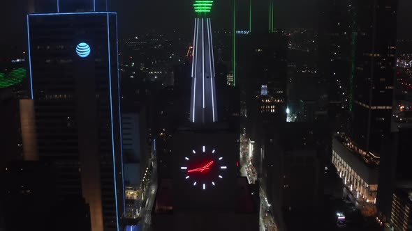 Closeup View of Neon Illuminated Spike and Clock on Top of Mercantile National Bank Building alt