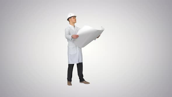 Handsome Engineer, Architect, Builder, Businessman, Wearing a White Helmet Holding a Project in His alt