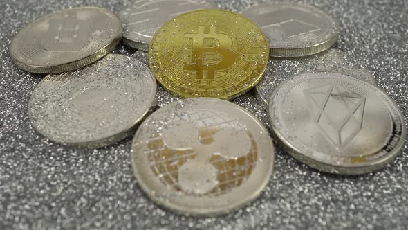 Cryptocurrencies Lie on Silver Sequins alt