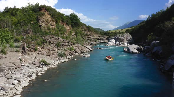 Rafting in clear blue water of Vjosa river, Albania. Summer adventures, extreme sports alt