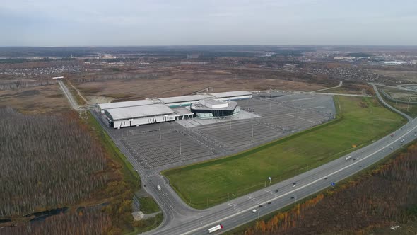 A building for conferences, exhibitions, concerts with and highway with cars 04 alt