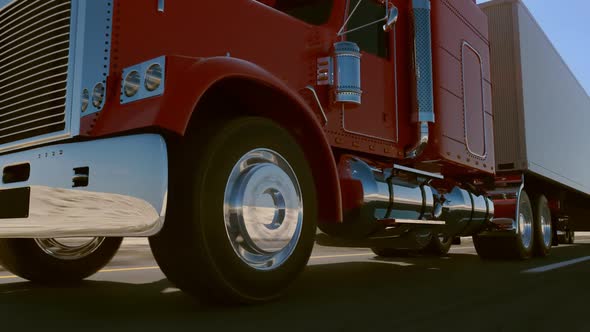 Huge semi-trailer cargo truck riding on the highway. Zoom-out animation. HD alt