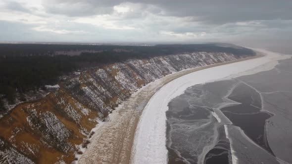 Frozen River Bay And Stormy Clouds