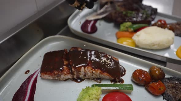 Roasted Salmon Meal on Plate in Restaurant, Chef Preparing Dinner alt