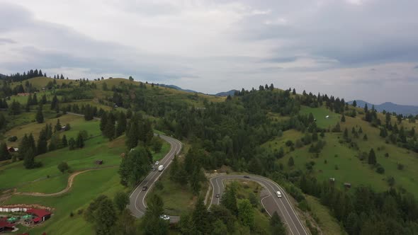 Spectacular Road With Cars Over The Hills