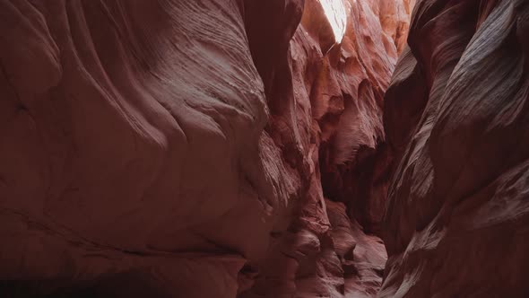 Picturesque Deep Slot Canyon With Wavy And Smooth Orange Red Stone Rock Walls alt