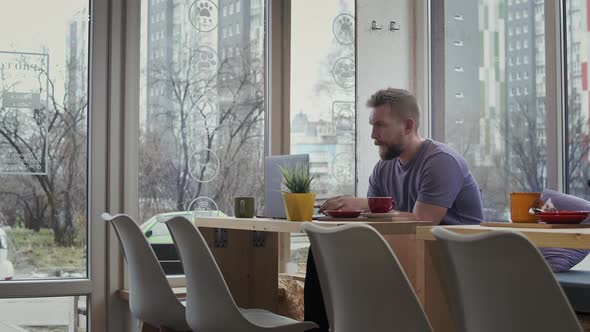 Bearded Man Drinking Coffee