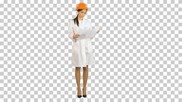 Young engineer woman in safety helmet, Alpha Channel