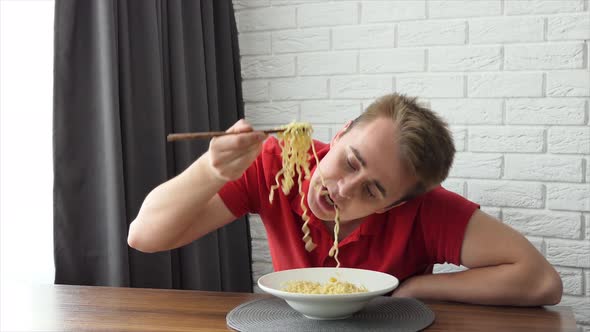 A Man Eats Vermicelli Fast Food Pasta