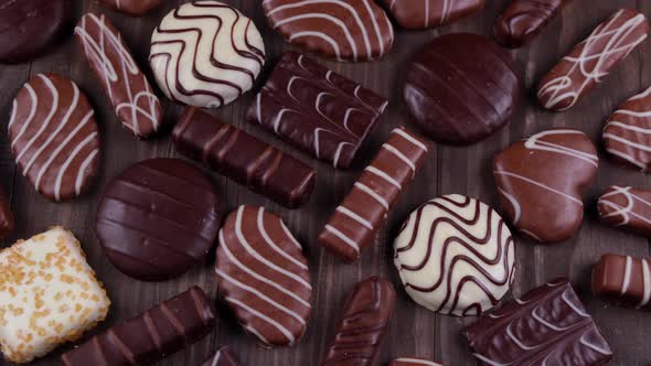 Composition Rotating Chocolate Chip Cookies of Various Shapes and Chocolates and Coffee Grains or alt