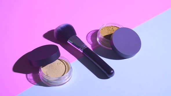 Make Up Concept. Top View of Makeup Brush with Face Powder alt
