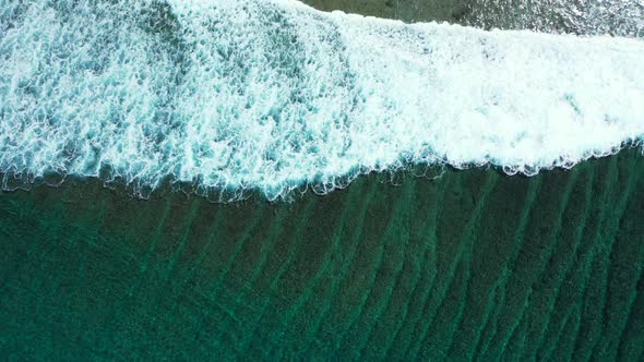 Aerial drone shot tourism of beautiful coast beach voyage by blue sea and white sand background of a alt