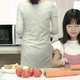 Little girl learning cooking with mom - VideoHive Item for Sale