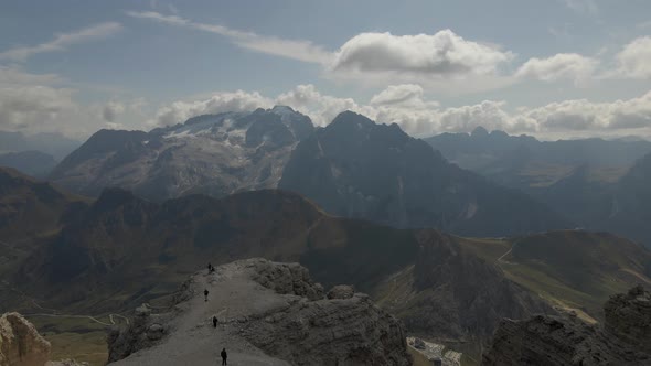 Aerial view: Dolomites in Val Gardena, Italy. Astonishing panorama, high mountain peaks with tourist alt
