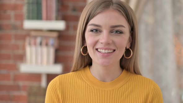Portrait of Happy Young Woman Doing Video Chat alt