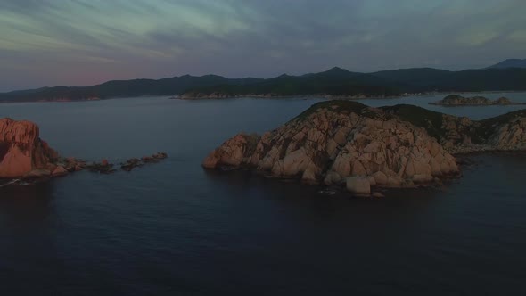 View From a Drone To a Beautiful Island in the Triozerie Bay at Sunrise alt