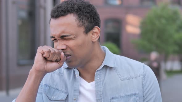 Sick African Man Coughing Outdoor alt