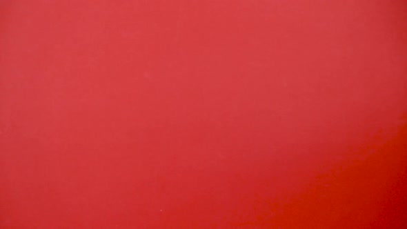 Santa Claus Hand Holding a Smartphone with a Blank Screen alt