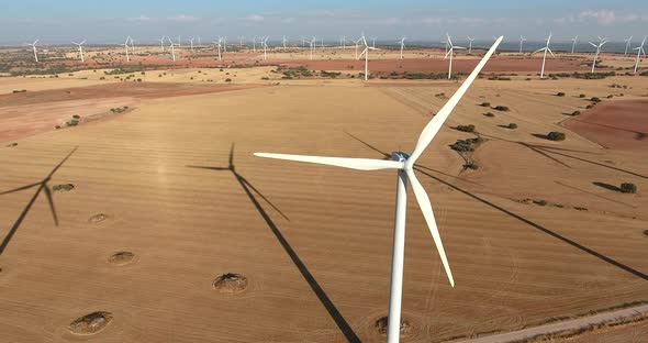 aerial view of a eolic wind mill park in countryside alt
