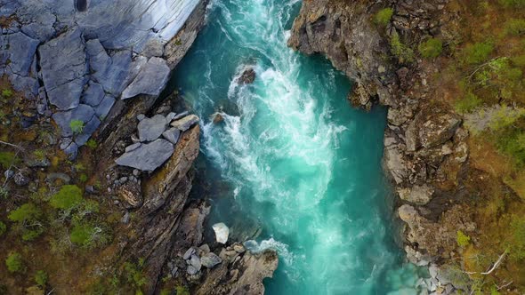 Fly above the surface of a mountain river Glomaga,Marmorslottet , Mo i Rana,Norway alt