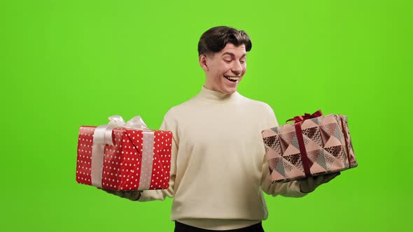 The Man is Standing and Looking at the Camera alt