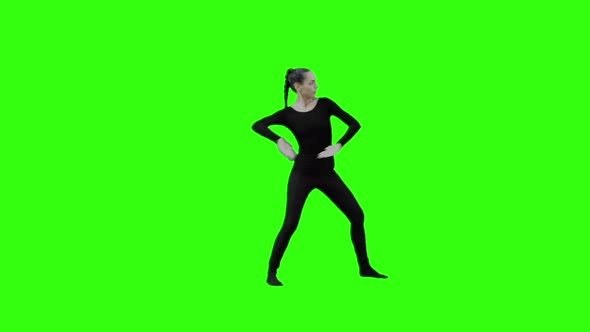 Girl Power Training Marshal Art Starting in Yoga pose with Green Screen. alt