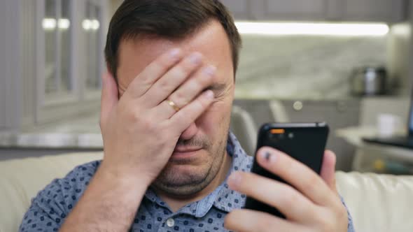 Portrait of Manager Cringe and Looking at Phone Screen with Squeamishness Inappropriate Content alt