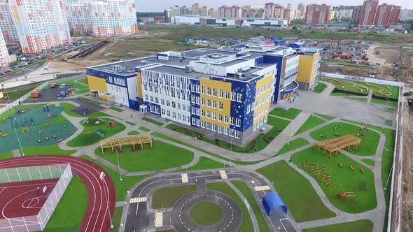 the exterior of the new modern school in the modern residential district,exterior alt