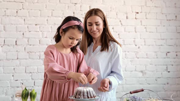 The Girls' Hands are Sitting on the Ester alt