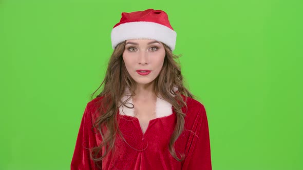 Snow Maiden Points Her Finger a Little More Quietly. Green Screen. Close Up. Slow Motion alt