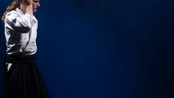 Two Fighters Participants of the Training in Special Clothes of Aikido Hakama Work Out the Methods alt