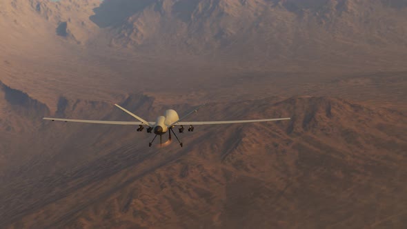 Maneuverable, armed military drone (UAV) flying smoothly over a vast desert. 4K