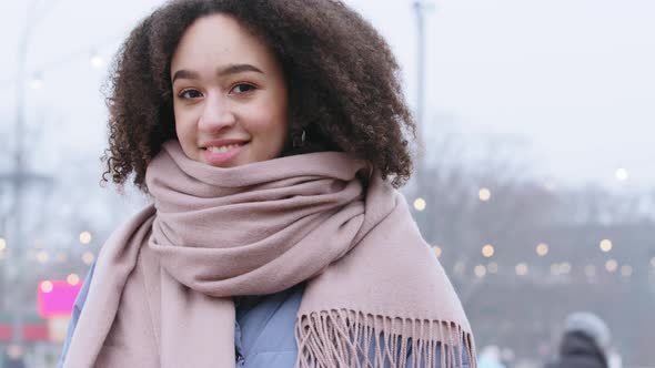 Portrait of Smiling Young Curlyhaired Mixed Race African American Girl Woman with Stylish Afro alt