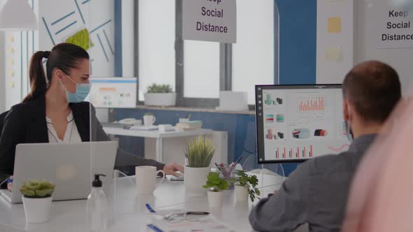 Business Team Looking at Financial Strategy in Office Company alt