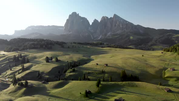 Aerial Slider Shot of Alpe di Suisi Meadow in the Dolomites Mountains Italy