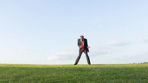 Crazy businessman playing air guitar