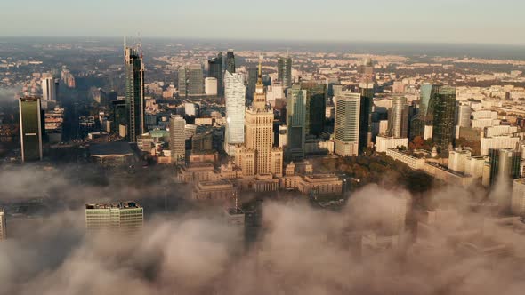 Aerial Panoramic Footage of Downtown High Rise Buildings in Morning Sun alt