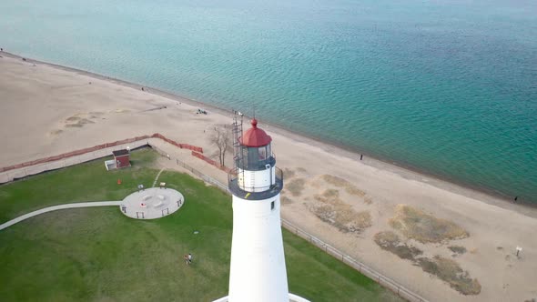 Fort Gratiot Lighthouse in Port Huron, Michigan with drone videoing in a circle. alt