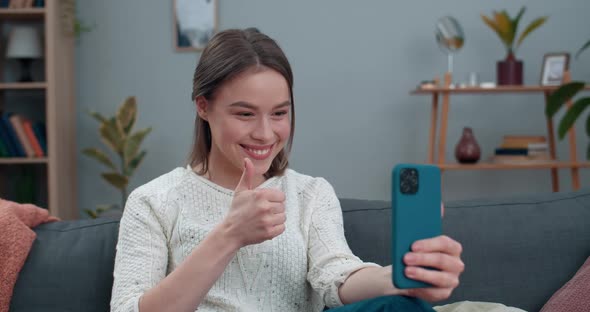 Woman Having Video Call and Saying with Sign Language Hello, How Are You Female Cheerful Person alt