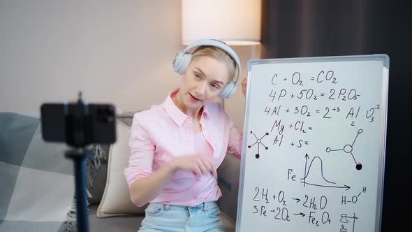Female Chemistry Teacher Makes a Lesson Online Live Broadcast of the Learning Process Using a alt
