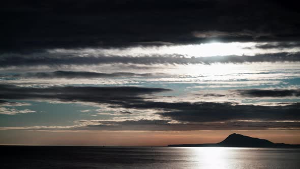 Dark Clouds over Sea at Morning, Timelapse alt