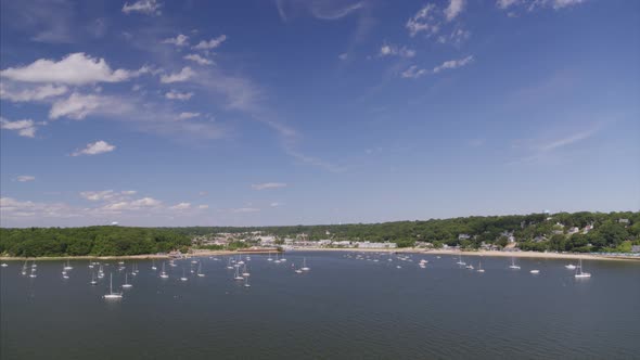 Aerial View of Anchored Boats and Long Island Beach Shore alt