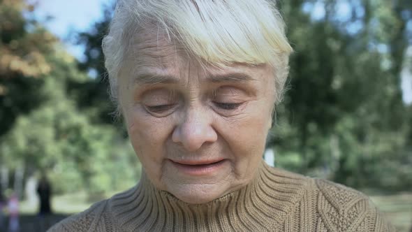 Mature Unhappy Woman Crying Outdoors, Old Age Problems, Loneliness Despair