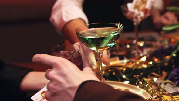 Friends Celebrate Holiday in an Expensive Restaurant and Drink Cocktails