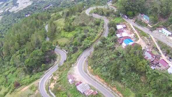 aerial shot of the road above the mountain