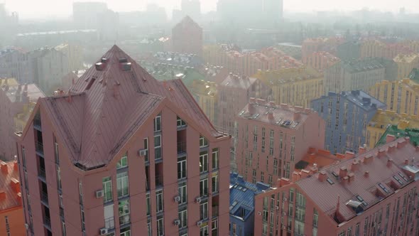 Top view of the colorful modern buildings, aerial footage from the drone alt