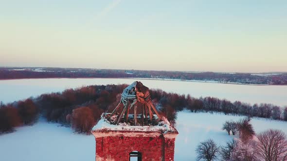 Ancient Church at Sunset in the Middle of Winter in Belarus