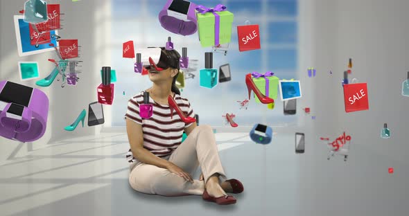 Woman using virtual reality headset with digitally generated sale icons 4k alt