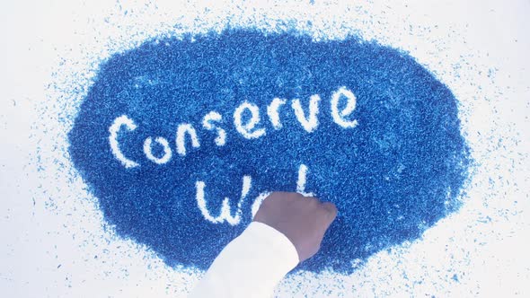 South Asian Hand Writes On Blue Conserve Water